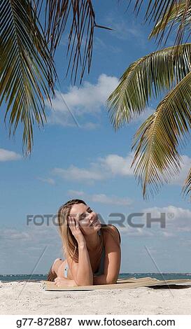 Woman on the beach, Miami, Florida, USA View Large Photo Image Stock Photo - Woman on the beach, Miami, Florida, USA. Fotosearch