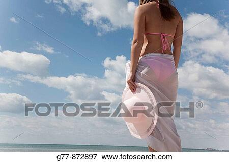 Woman on the beach, Miami, Florida, USA View Large Photo Image Stock Photo - Woman on the beach, Miami, Florida, USA. Fotosearch