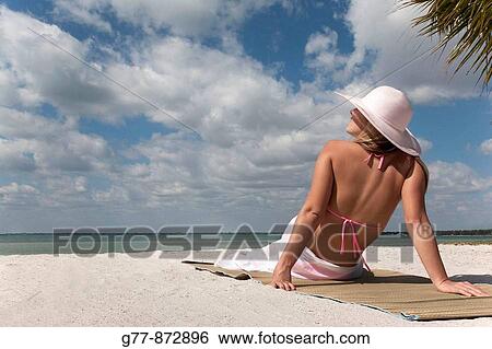 Woman on the beach, Miami, Florida, USA View Large Photo Image Stock Photograph - Woman on the beach, Miami, Florida, USA. Fotosearch