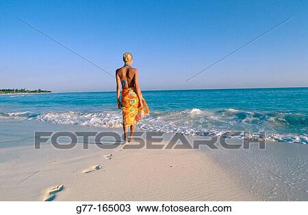 Woman on the beach of Playa Sirena, Cayo Largo, Cuba View Large Photo Image Stock Image - Woman on the beach of Playa Sirena, Cayo Largo, Cuba. Fotosearch