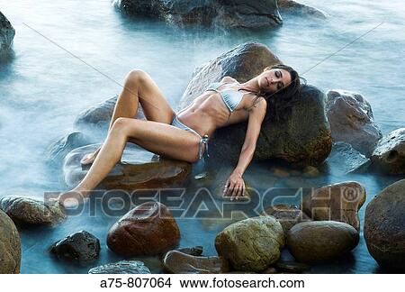 Woman on the beach View Large Photo Image Picture - Woman on the beach. Fotosearch
