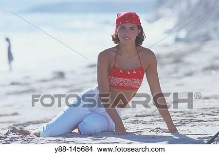 Picture - Woman on the beach. Fotosearch