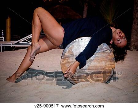 Stock Photo - Woman on the beach, Saona Island, Dominican Republic. Fotosearch