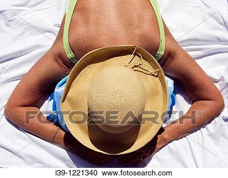 Woman on the beach View Large Photo Image Stock Image - Woman on the beach. Fotosearch