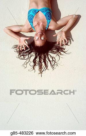 Woman on the beach View Large Photo Image Stock Photograph - Woman on the beach. Fotosearch