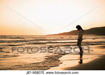 Woman on the beach. Tarifa, Andalusia, Spain View Large Photo Image Stock Image - Woman on the beach. Tarifa, Andalusia, Spain. Fotosearch