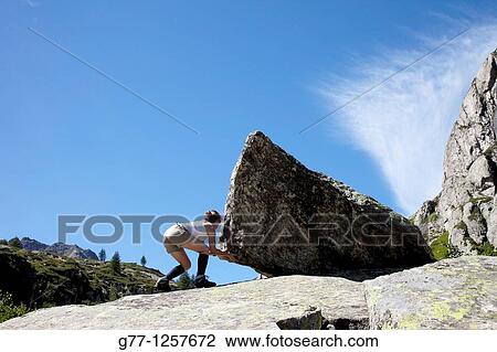 Stock Image - Woman on the mountain, Formazza valley, Piedmont Alps, Italy. Fotosearch
