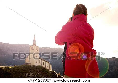 Woman on the mountain, Formazza valley, Piedmont Alps, Italy View Large Photo Image Stock Photo - Woman on the mountain, Formazza valley, Piedmont Alps, Italy. Fotosearch