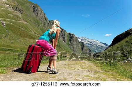 Woman on the mountain. Italy, Piedmont Alps, Formazza Valley. View Large Photo Image Stock Image - Woman on the mountain. Italy, Piedmont Alps, Formazza Valley.. Fotosearch