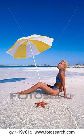 Woman on tropical beach. Cayo Largo. Cuba View Large Photo Image Stock Photography - Woman on tropical beach. Cayo Largo. Cuba. Fotosearch