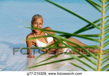 Woman on tropical beach. Maldives Islands View Large Photo Image Stock Photo - Woman on tropical beach. Maldives Islands. Fotosearch