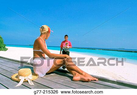 Woman on tropical beach. Maldives Islands View Large Photo Image Stock Photograph - Woman on tropical beach. Maldives Islands. Fotosearch
