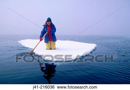 Woman paddling an icefloe near Petermann Island. Antarctica View Large Photo Image Stock Photograph - Woman paddling an icefloe near Petermann Island. Antarctica. Fotosearch
