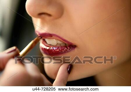 Woman painting brush and lipstick close up View Large Photo Image Stock Photography - Woman painting brush and lipstick close up. Fotosearch