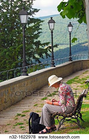 Woman painting, Radda in Chianti, Siena Province, Tuscany, Italy View Large Photo Image Stock Photo - Woman painting, Radda in Chianti, Siena Province, Tuscany, Italy. Fotosearch