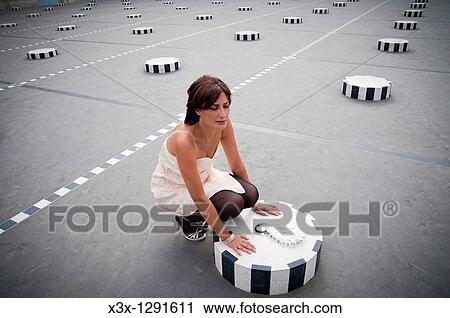 Woman Palais Royal in Paris France View Large Photo Image Stock Image - Woman Palais Royal in Paris France. Fotosearch