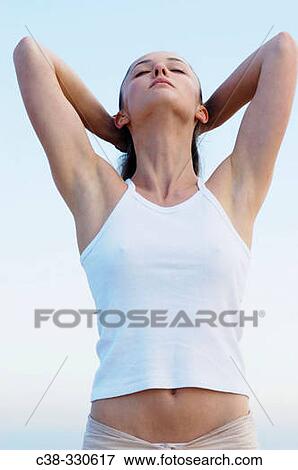 Woman performing yoga View Large Photo Image Stock Photo - Woman performing yoga. Fotosearch