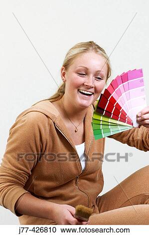 Woman picking colours, painting. View Large Photo Image Stock Image - Woman picking colours, painting.. Fotosearch