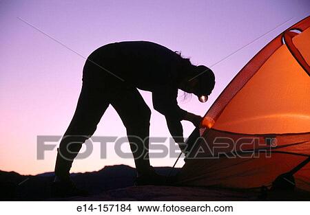 Woman pitching tent. Utah. USA View Large Photo Image Picture - Woman pitching tent. Utah. USA. Fotosearch