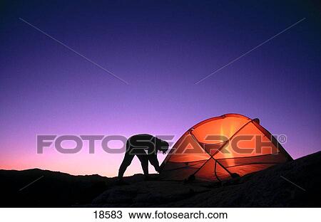 Woman pitching tent. Utah. USA View Large Photo Image Stock Image - Woman pitching tent. Utah. USA. Fotosearch