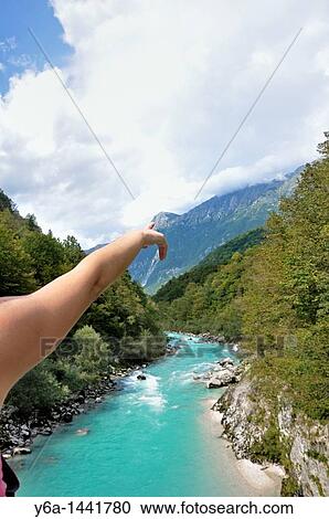 Woman pointing at mountain peak, Triglav National Park, Julian Alps, Slovenia, Septembar 2010 View Large Photo Image Stock Image - Woman pointing at mountain peak, Triglav National Park, Julian Alps, Slovenia, Septembar 2010. Fotosearch
