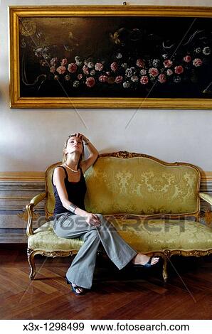 Stock Photo - Woman portrait in a luxurious house. Fotosearch