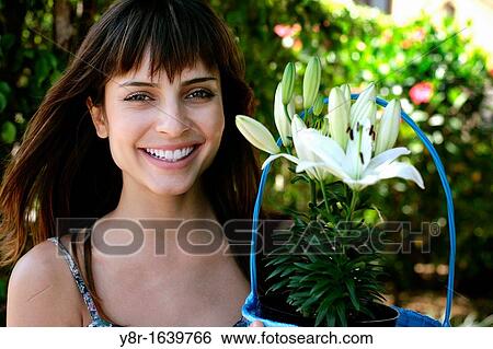 woman portrait with plants View Large Photo Image Stock Photograph - woman portrait with plants. Fotosearch