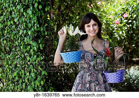 woman portrait with plants View Large Photo Image Stock Photography - woman portrait with plants. Fotosearch