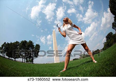 Woman poses front Washington Monument, Washington D. C., USA View Large Photo Image Stock Image - Woman poses front Washington Monument, Washington D. C., USA. Fotosearch