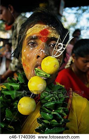 Woman possessed by the goddess Ankalaparamecuvari, who is renowned throughout Tamil Nadu for making her power available to devotees, Mel Malaiyanur temple Mel Malaiyanur Melmalaiyanur, Gingee, Tamil Nadu, India. View Large Photo Image Stock Photography - Woman possessed by the goddess Ankalaparamecuvari, who is renowned throughout Tamil Nadu for making her power available to devotees, Mel Malaiyanur temple Mel Malaiyanur Melmalaiyanur, Gingee, Tamil Nadu, India.. Fotosearch
