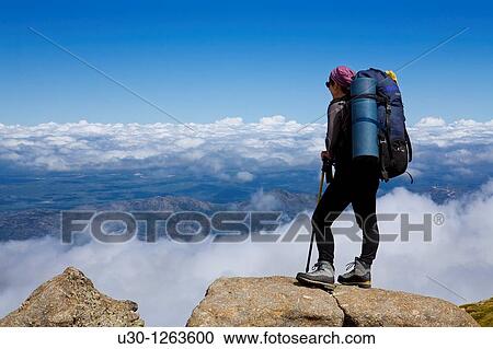 Woman practicing mountaineering in the Sierra de B? jar Natural Park, in Salamanca province, Biosphere Reserve of Sierra de B? jar and Francia View Large Photo Image Stock Image - Woman practicing mountaineering in the Sierra de B? jar Natural Park, in Salamanca province, Biosphere Reserve of Sierra de B? jar and Francia. Fotosearch