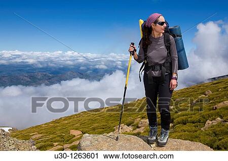 Woman practicing mountaineering in the Sierra de B? jar Natural Park, in Salamanca province, Biosphere Reserve of Sierra de B? jar and Francia View Large Photo Image Stock Image - Woman practicing mountaineering in the Sierra de B? jar Natural Park, in Salamanca province, Biosphere Reserve of Sierra de B? jar and Francia. Fotosearch