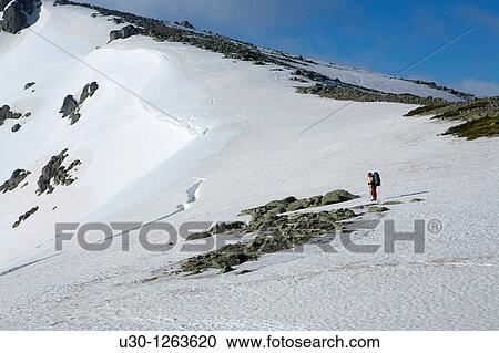 Woman practicing mountaineering in the Sierra de B? jar Natural Park, in the provincial boundary between Salamanca and Avila, Biosphere Reserve of Sierra de B? jar and Francia View Large Photo Image Stock Image - Woman practicing mountaineering in the Sierra de B? jar Natural Park, in the provincial boundary between Salamanca and Avila, Biosphere Reserve of Sierra de B? jar and Francia. Fotosearch