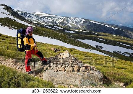 Woman practicing mountaineering in the Sierra de B? jar Natural Park, in Salamanca province, Biosphere Reserve of Sierra de B? jar and Francia View Large Photo Image Stock Image - Woman practicing mountaineering in the Sierra de B? jar Natural Park, in Salamanca province, Biosphere Reserve of Sierra de B? jar and Francia. Fotosearch