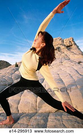 Woman practicing yoga at Snow Canyon State Park. Utah, USA View Large Photo Image Stock Image - Woman practicing yoga at Snow Canyon State Park. Utah, USA. Fotosearch