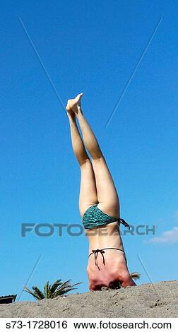 Woman Practicing Yoga at the Beach View Large Photo Image Stock Photograph - Woman Practicing Yoga at the Beach. Fotosearch