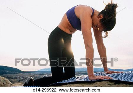 Woman practicing yoga. Utah, USA View Large Photo Image Stock Image - Woman practicing yoga. Utah, USA. Fotosearch