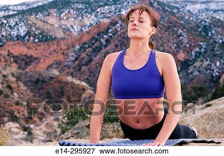 Woman practicing yoga. Utah, USA View Large Photo Image Stock Photo - Woman practicing yoga. Utah, USA. Fotosearch
