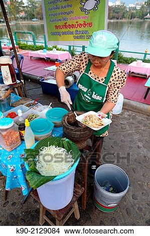 Woman preparing fresh papaya salad, Mae Hong Son, Thailand, Southeast Asia. View Large Photo Image Picture - Woman preparing fresh papaya salad, Mae Hong Son, Thailand, Southeast Asia.. Fotosearch