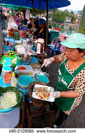 Woman preparing fresh papaya salad, Mae Hong Son, Thailand, Southeast Asia. View Large Photo Image Stock Photography - Woman preparing fresh papaya salad, Mae Hong Son, Thailand, Southeast Asia.. Fotosearch