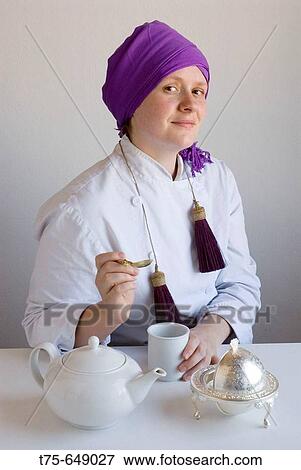 Woman preparing tea View Large Photo Image Stock Photo - Woman preparing tea. Fotosearch