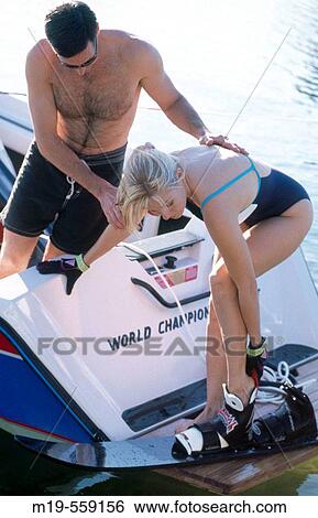woman preparing to water ski View Large Photo Image Stock Photograph - woman preparing to water ski. Fotosearch