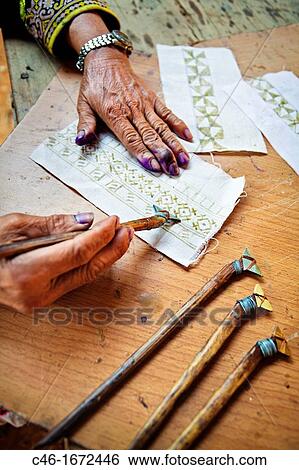Woman printing textiles, Hmong hill tribe? also called Meo?, Kiw Kran village near Chiang Khong, Chiang Rai Province, Thailand View Large Photo Image Stock Photograph - Woman printing textiles, Hmong hill tribe? also called Meo?, Kiw Kran village near Chiang Khong, Chiang Rai Province, Thailand. Fotosearch