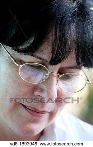 Woman reading a book View Large Photo Image Stock Photography - Woman reading a book. Fotosearch