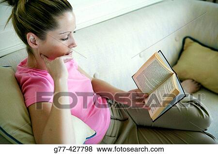Stock Photo - Woman reading.. Fotosearch