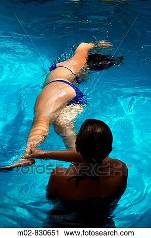 Woman relaxing in water View Large Photo Image Stock Image - Woman relaxing in water. Fotosearch