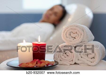 Woman relaxing on hot stone seat, Spa-relais View Large Photo Image Stock Photo - Woman relaxing on hot stone seat, Spa-relais. Fotosearch