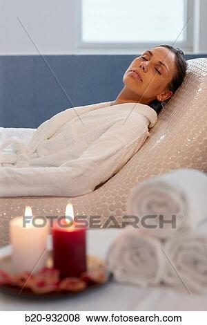 Woman relaxing on hot stone seat, Spa-relais View Large Photo Image Stock Photo - Woman relaxing on hot stone seat, Spa-relais. Fotosearch