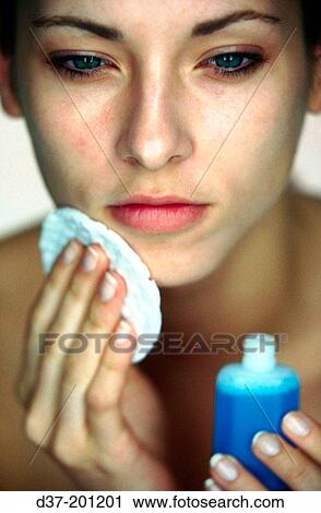 Woman removing make-up View Large Photo Image Stock Image - Woman removing make-up. Fotosearch