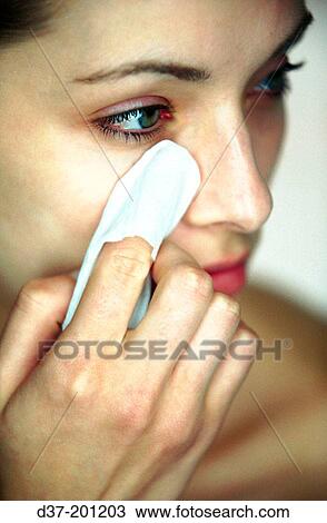 Woman removing make-up View Large Photo Image Stock Image - Woman removing make-up. Fotosearch